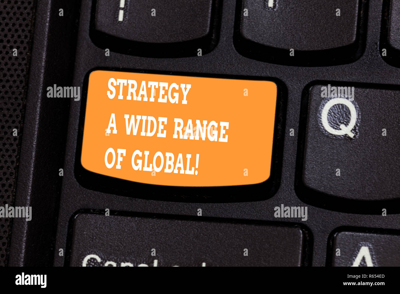 Handwriting text writing Strategy A Wide Range Of Global. Concept meaning Worldwide communications strategies Keyboard key Intention to create compute Stock Photo