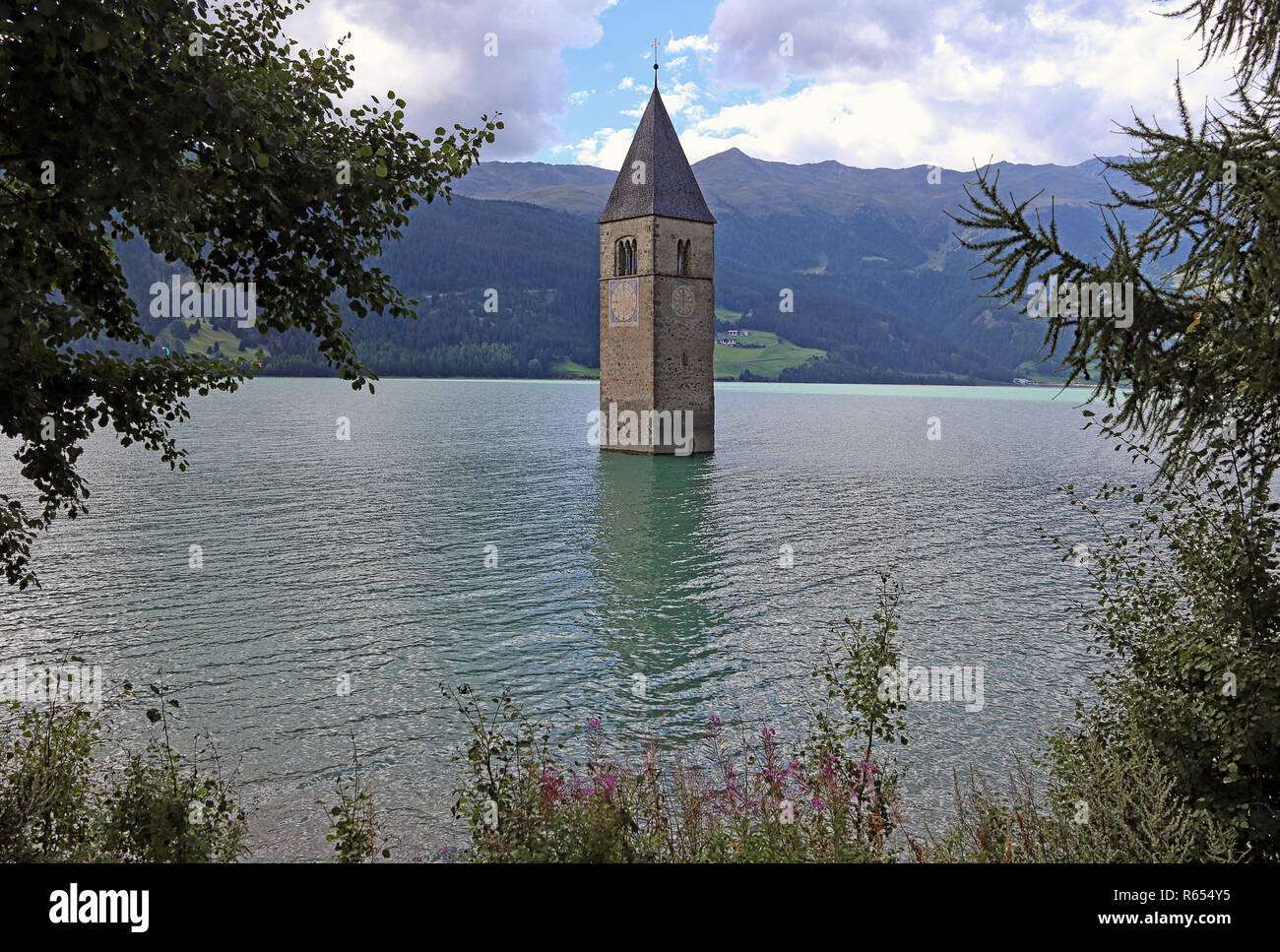 church tower in the reschensee in the vinschgau Stock Photo