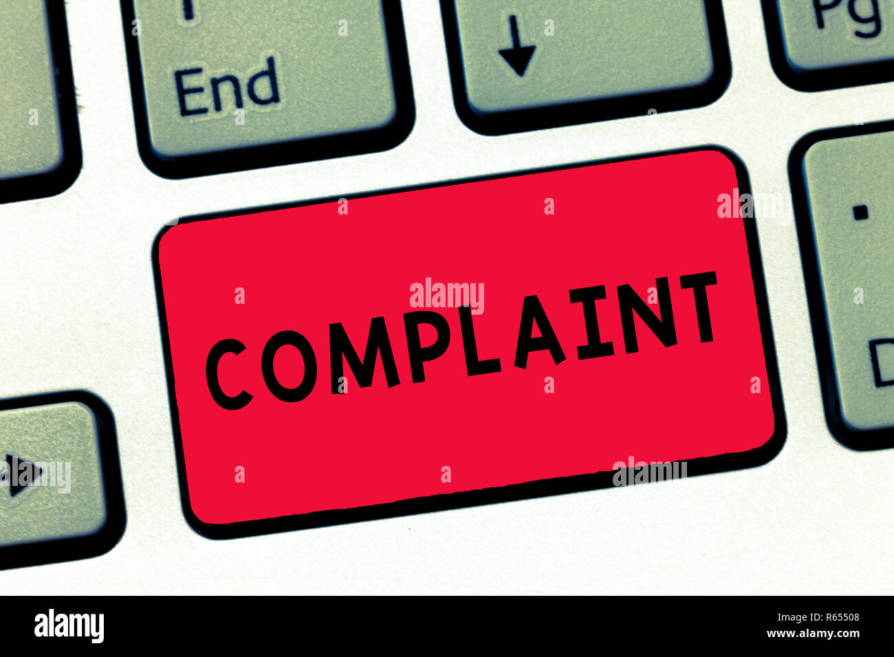 Text sign showing Complaint. Conceptual photo statement that something is unsatisfactory or unacceptable Keyboard key Intention to create computer mes Stock Photo