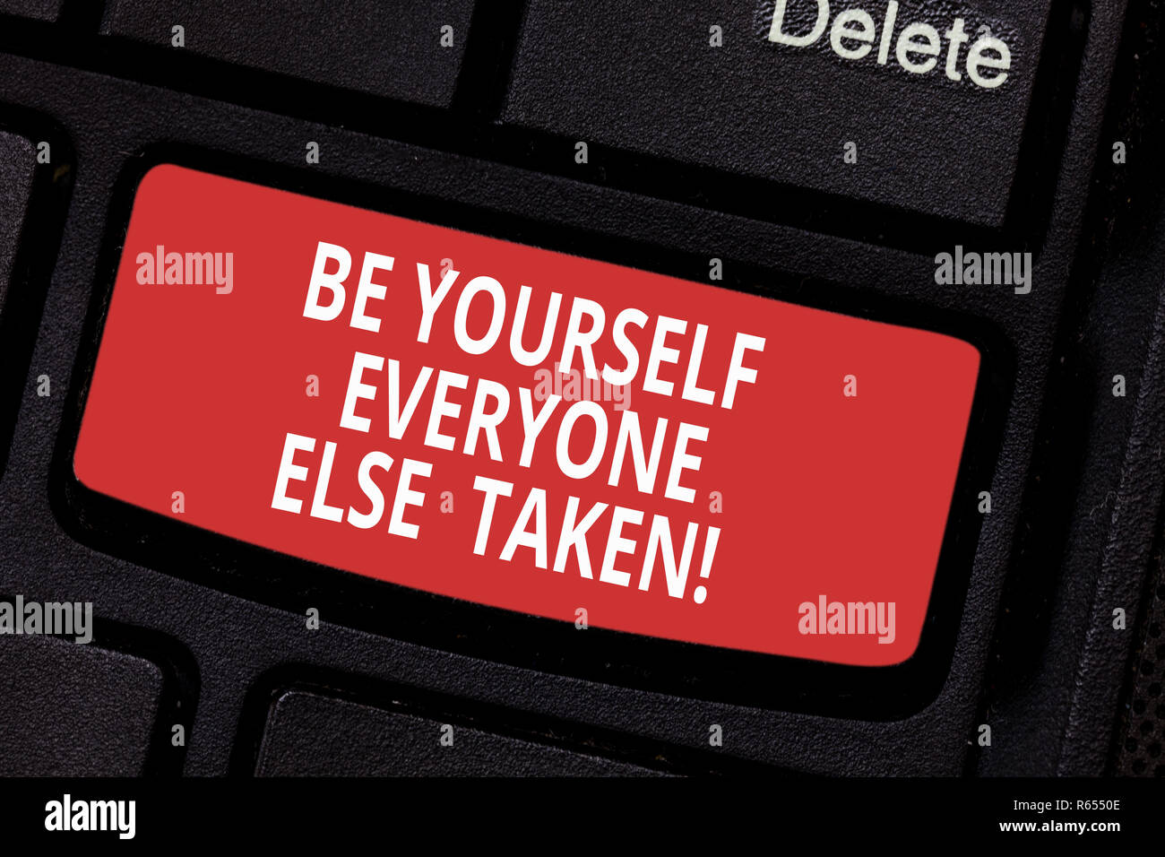 Conceptual hand writing showing Be Yourself Everyone Else Is Taken. Business photo text Have and show your own demonstratingality Keyboard key Intenti Stock Photo
