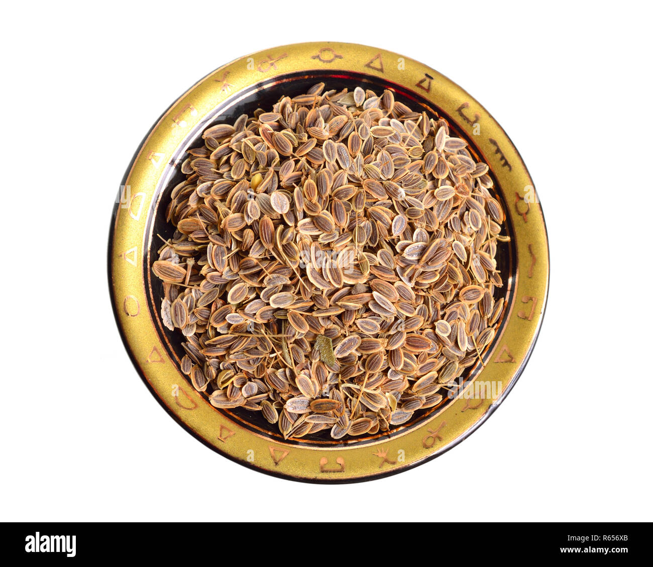 Stack of Dill seeds isolated on white background. Stock Photo