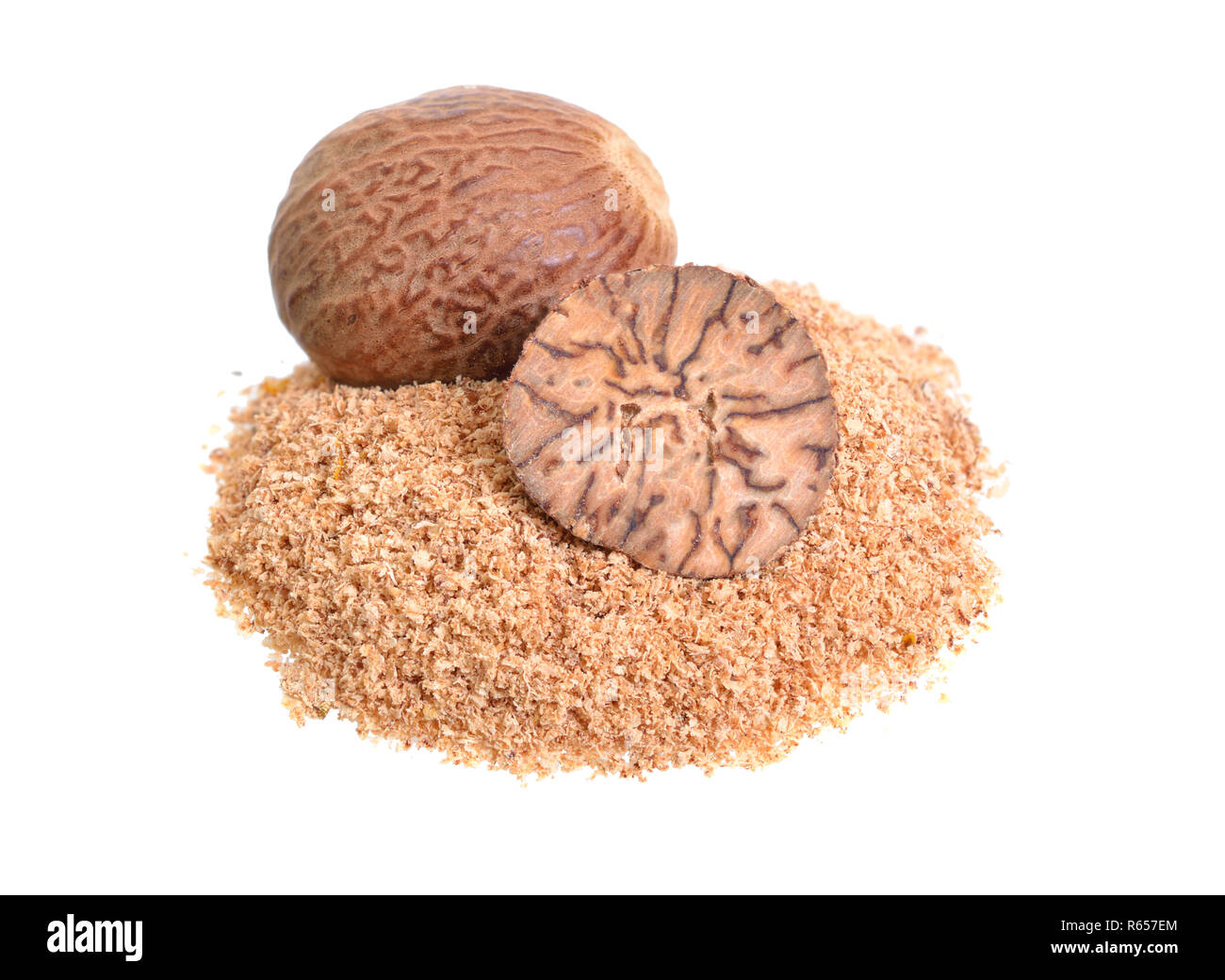 Nutmeg, fragrant nutmeg or true nutmeg. Whole nut, half and powder