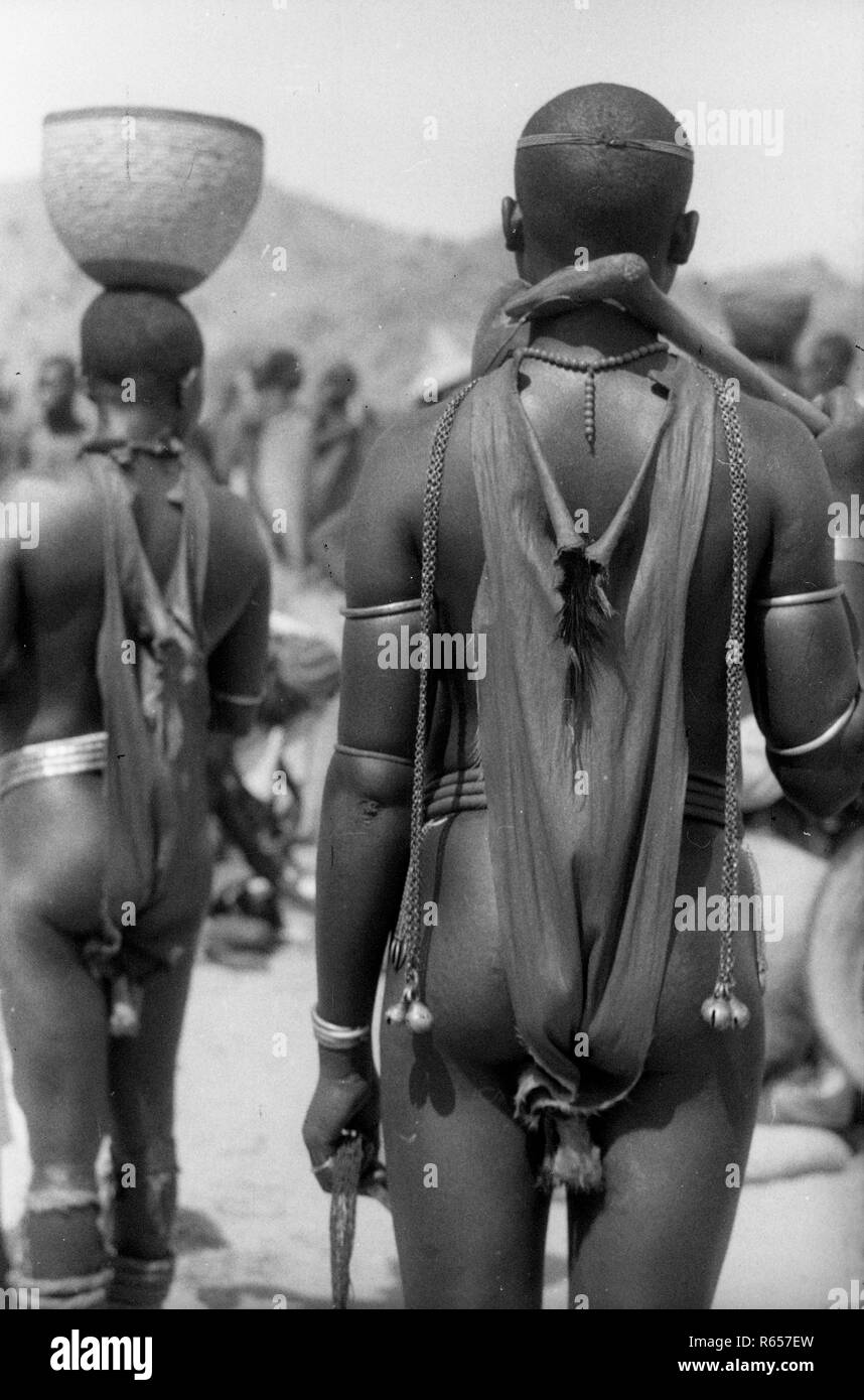 Native Tribes People wearing decorative body chastity belts Cameroon Africa 1950's Stock Photo