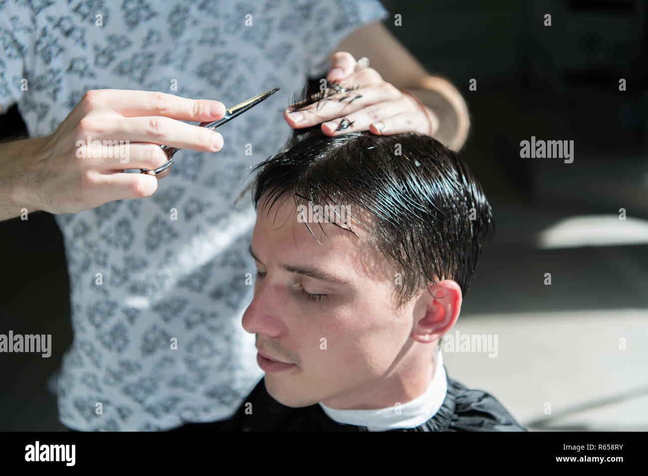 Hands Of Barber Scissors And Comb Guy Getting Haircut Close Up