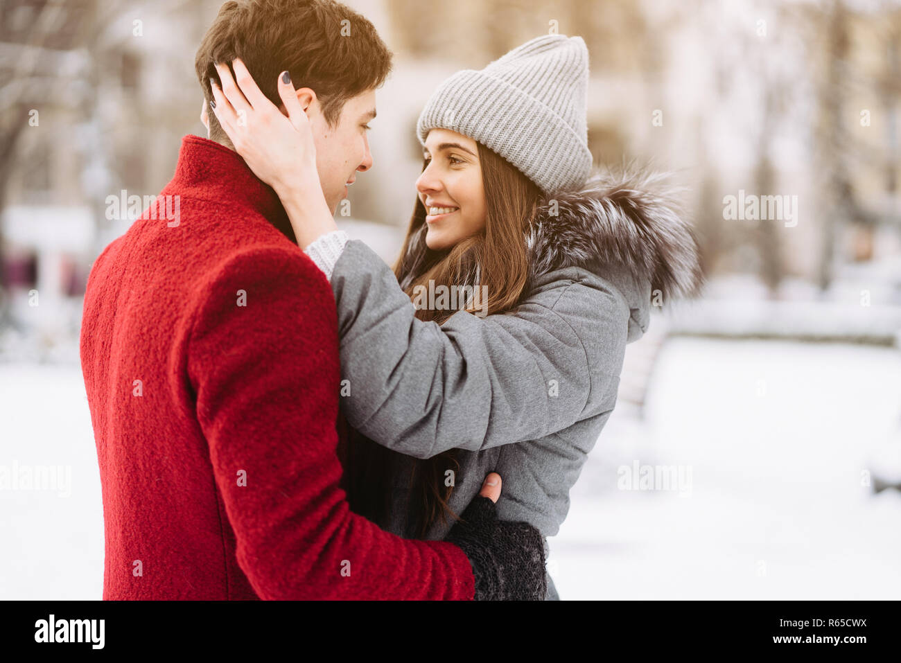 A young guy and a girl are hugging each other Stock Photo - Alamy