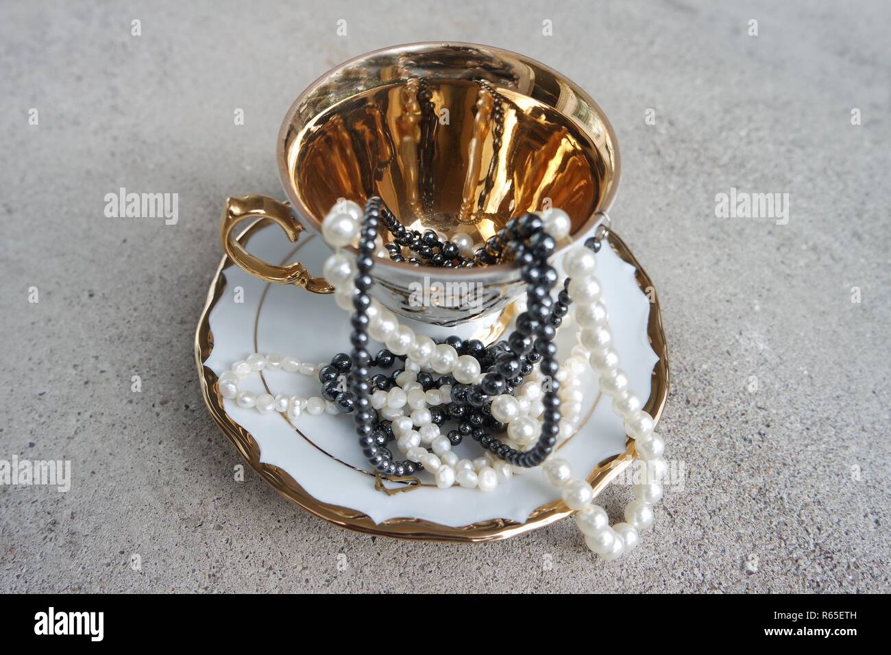 pearls in golden cup Stock Photo