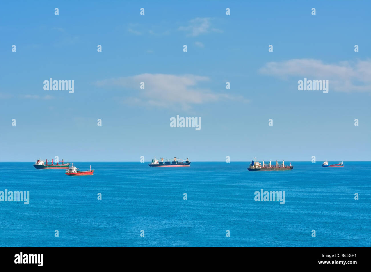 Cargo Ships at Anchorage Stock Photo - Alamy