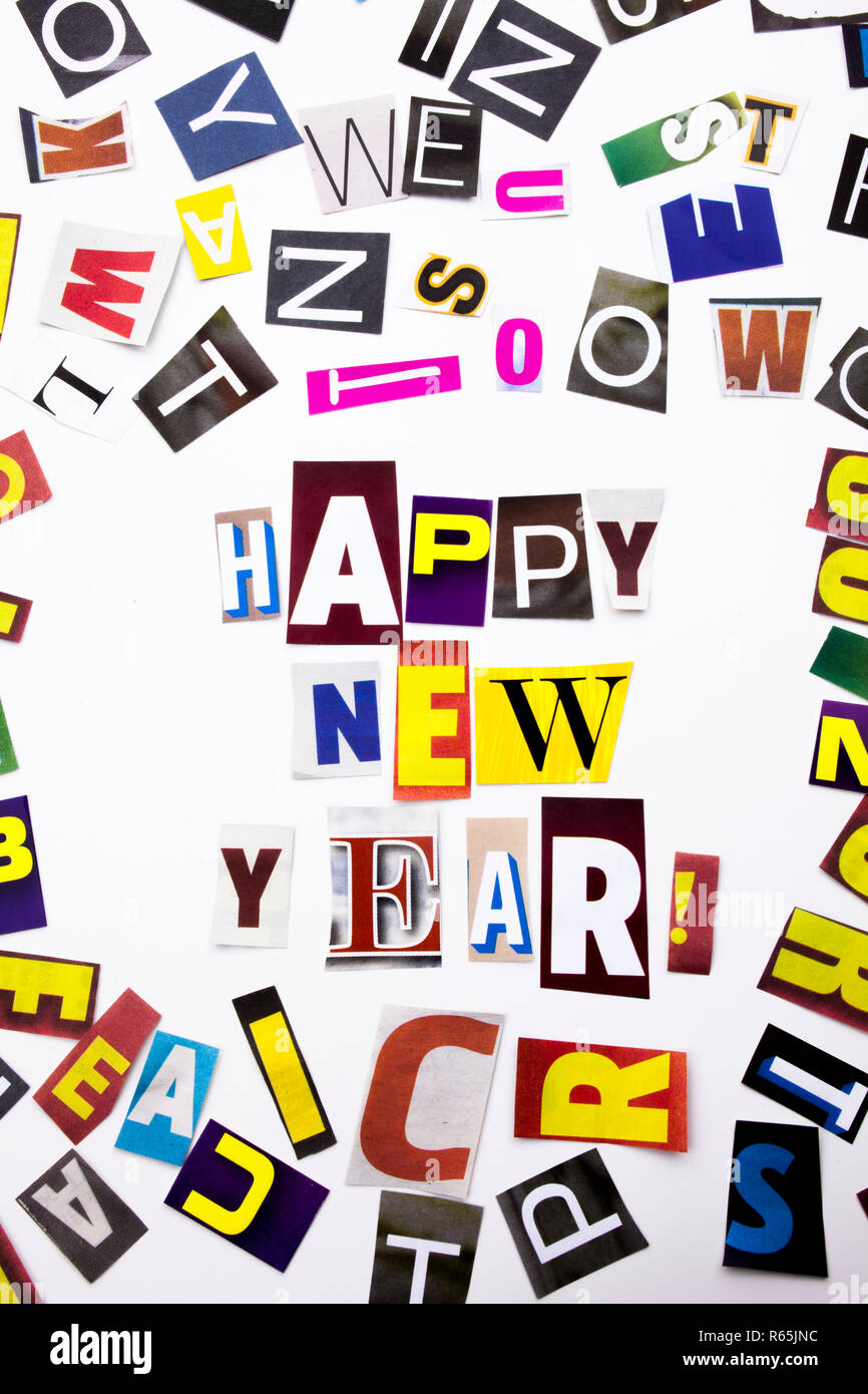 A word writing text showing concept of Happy New Year made of different magazine newspaper letter for Business case on the white background with copy space Stock Photo