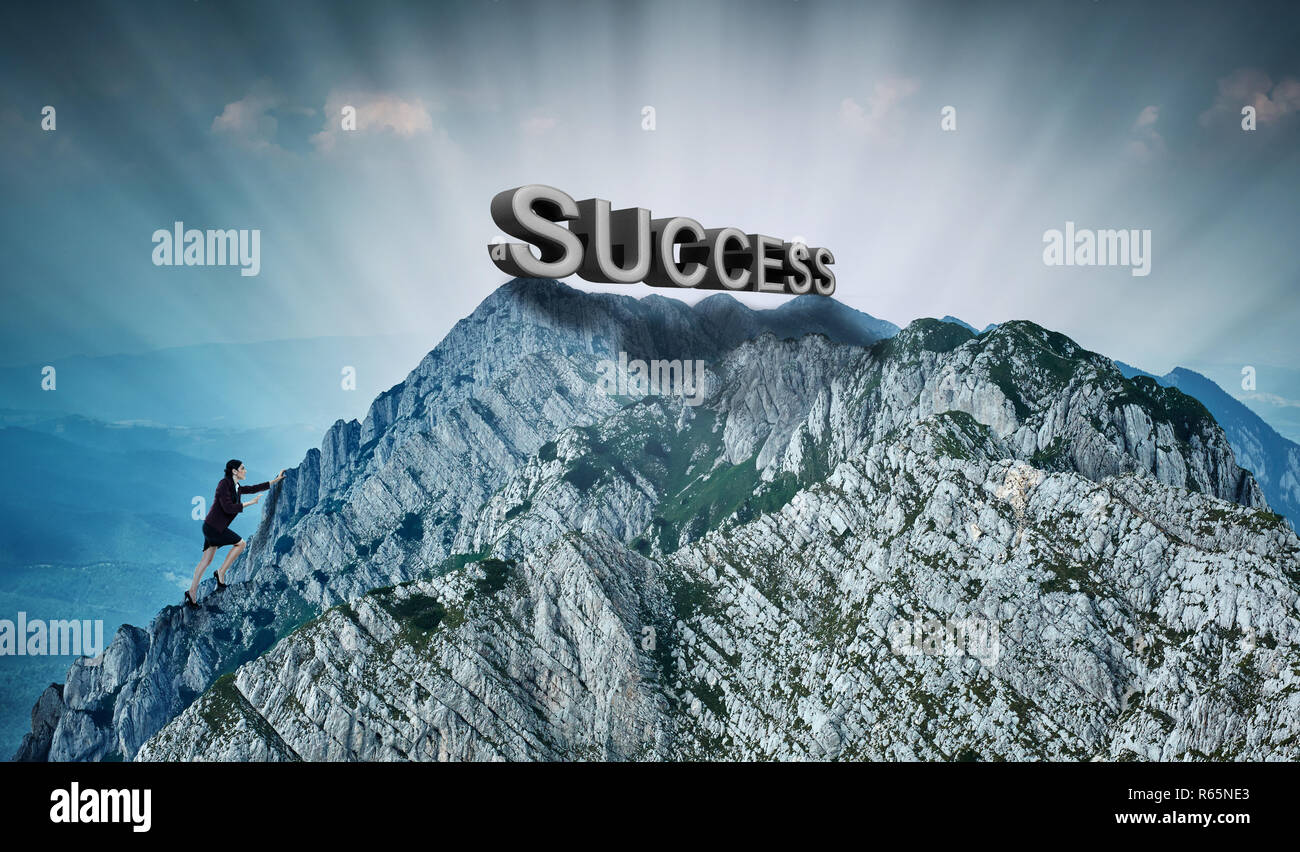 Businesswoman climbing a mountain to achieve success in career Stock Photo
