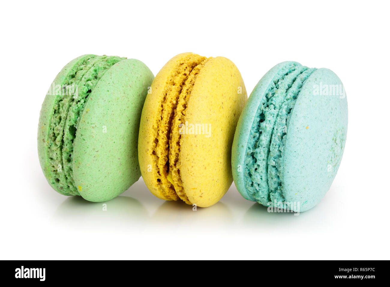 three macaroons isolated on white background closeup Stock Photo