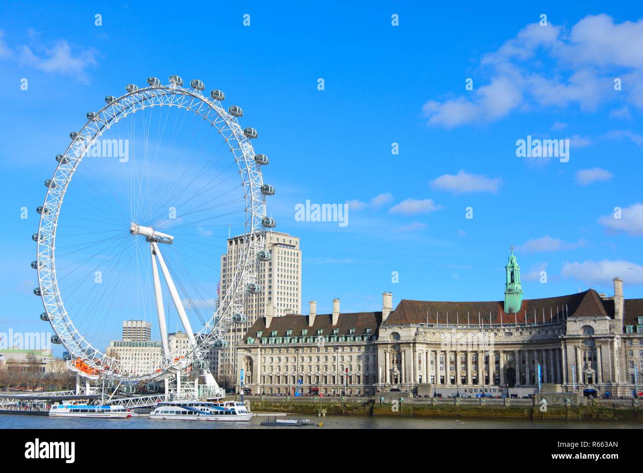 London Eye or Millennium Wheel on South Bank of River Thames in London England, UK Stock Photo