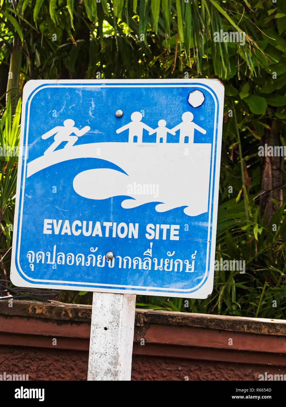 Sign at tsunami evacuation site near Kata Noi, Phuket, Thailand Stock Photo