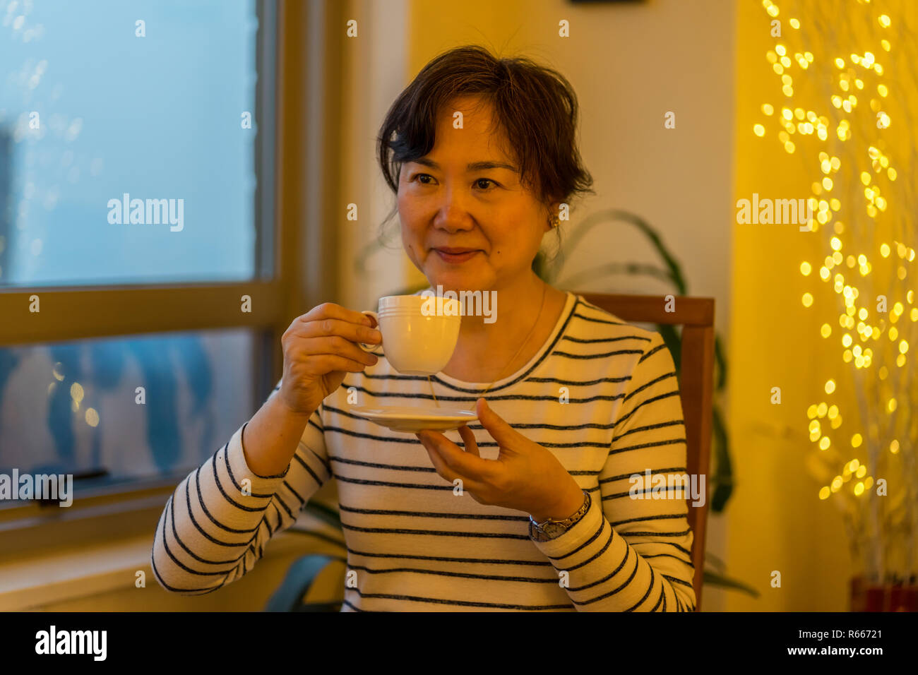 60s woman asian hi-res stock photography and images - Alamy