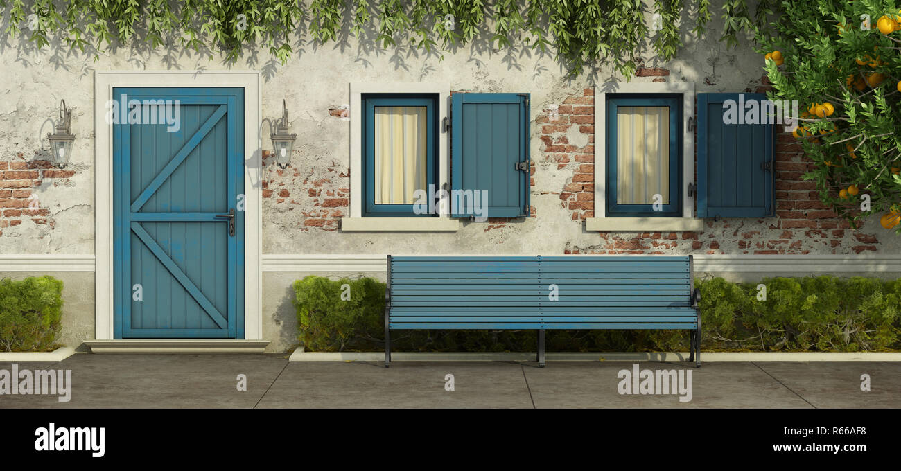 Old house with blue door and windows Stock Photo - Alamy