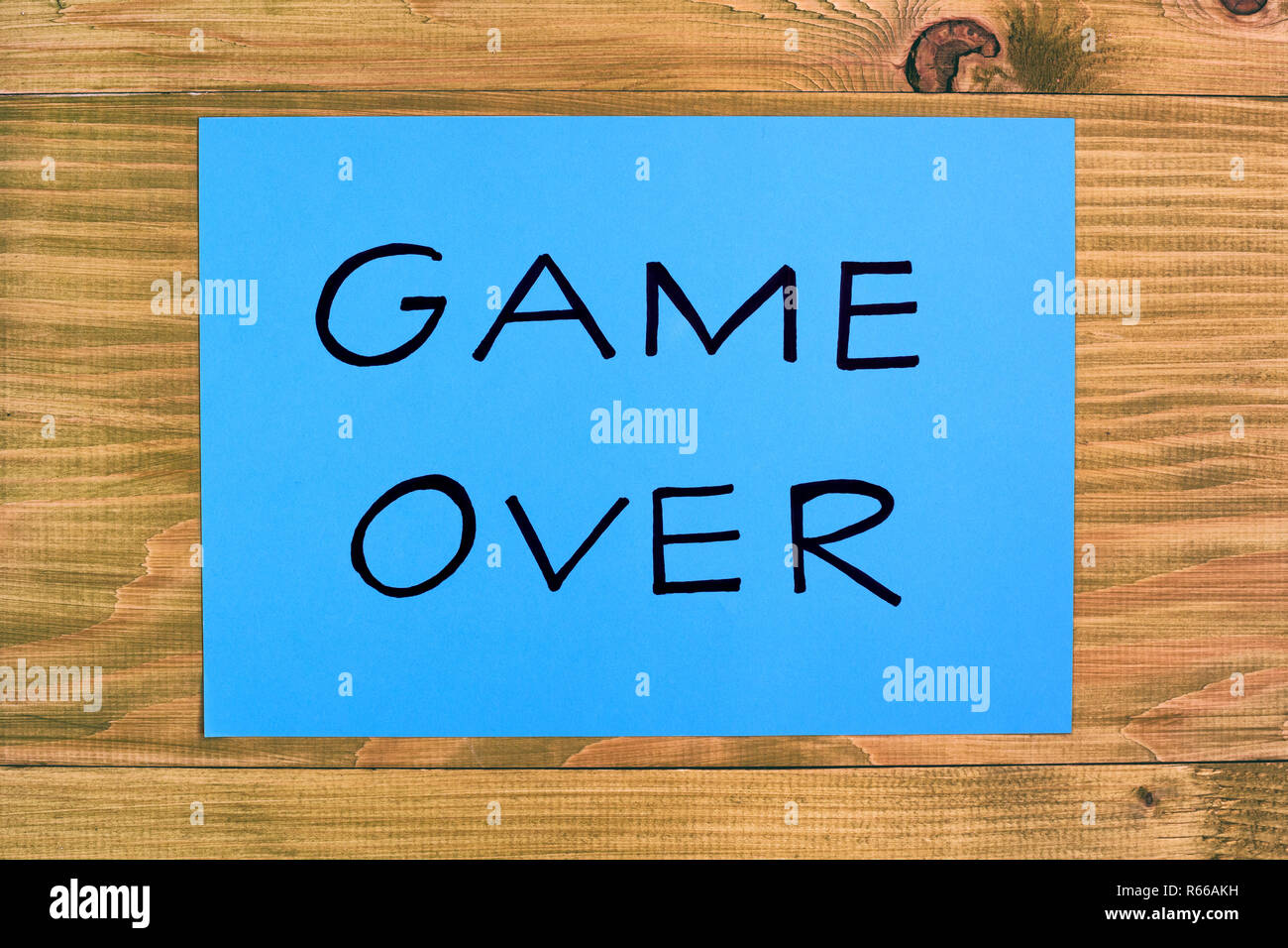 Text game over on wooden table,relationship breakup concept. Stock Photo