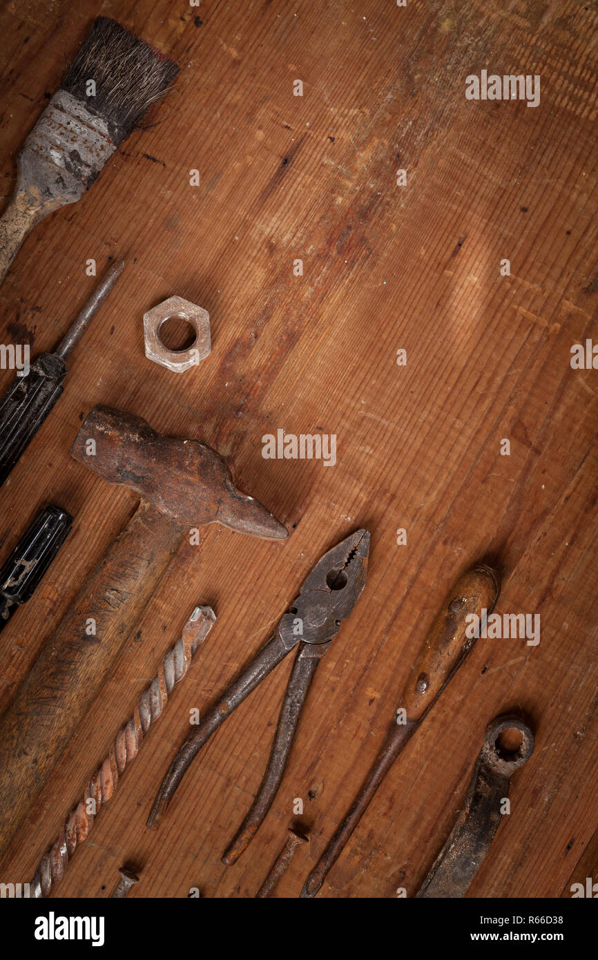 Collection of vintage tools on wooden background Stock Photo - Alamy