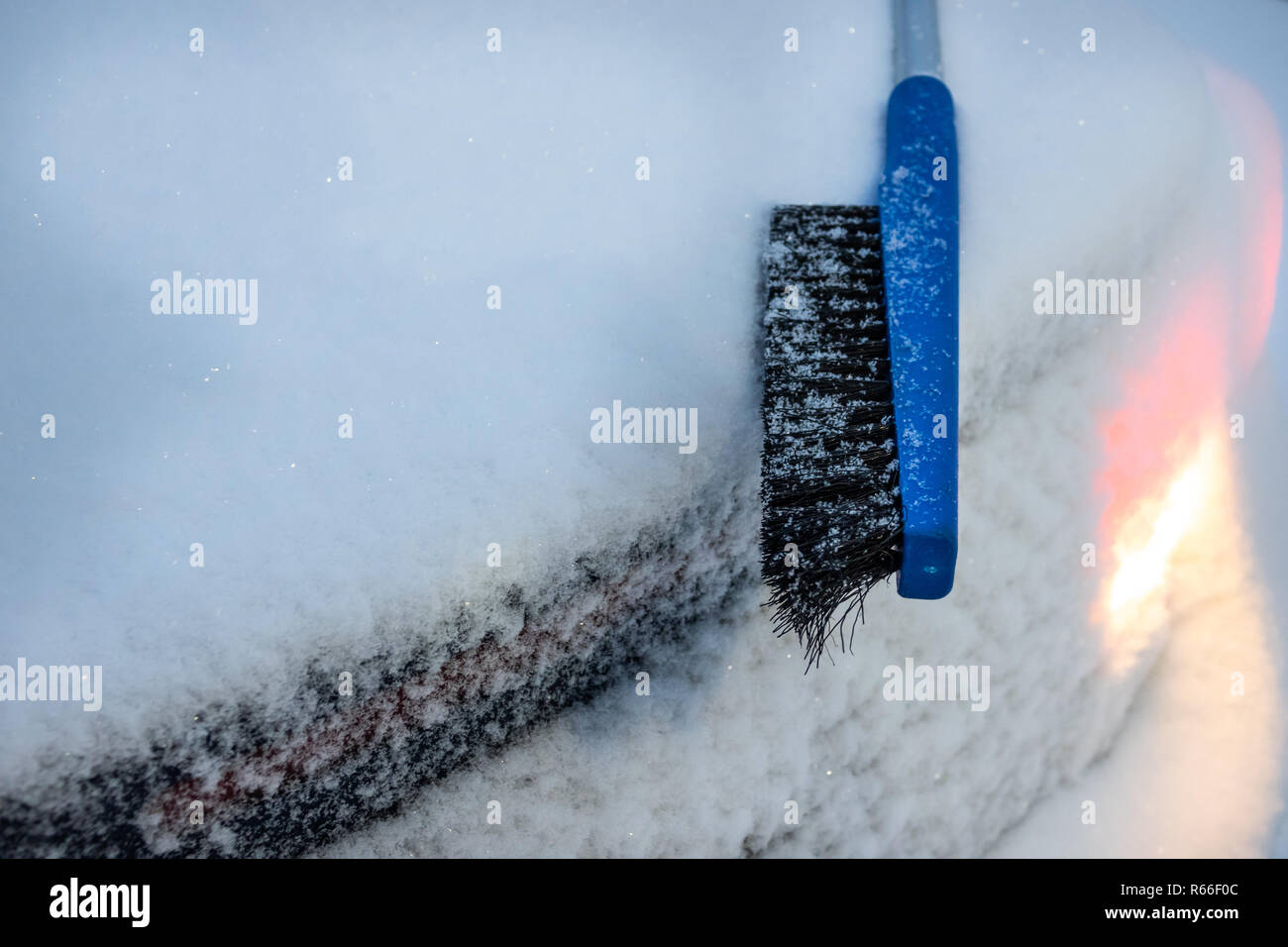 brush to clear snow and ice from car Stock Photo