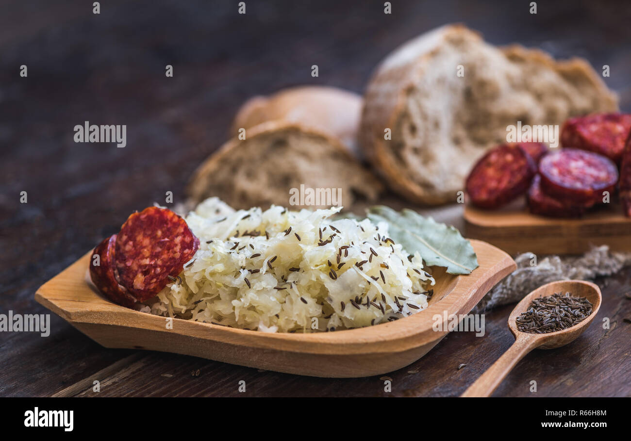 Farmer's Breakfast. Sausage, Sour Cabbage and Bread. Raw Ingredients