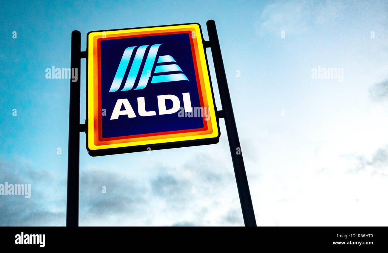 illuminated Aldi Sign at dusk in Dinnington, Rotherham UK Stock Photo