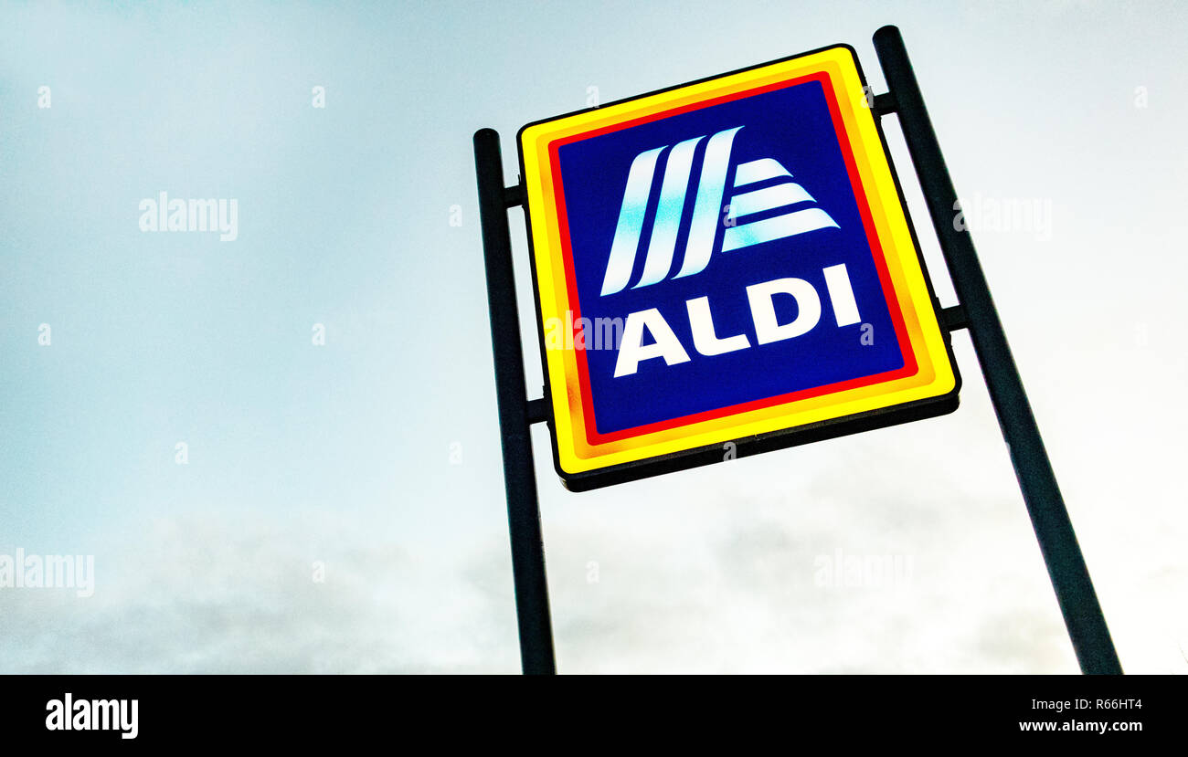 illuminated Aldi Sign at dusk in Dinnington, Rotherham UK Stock Photo