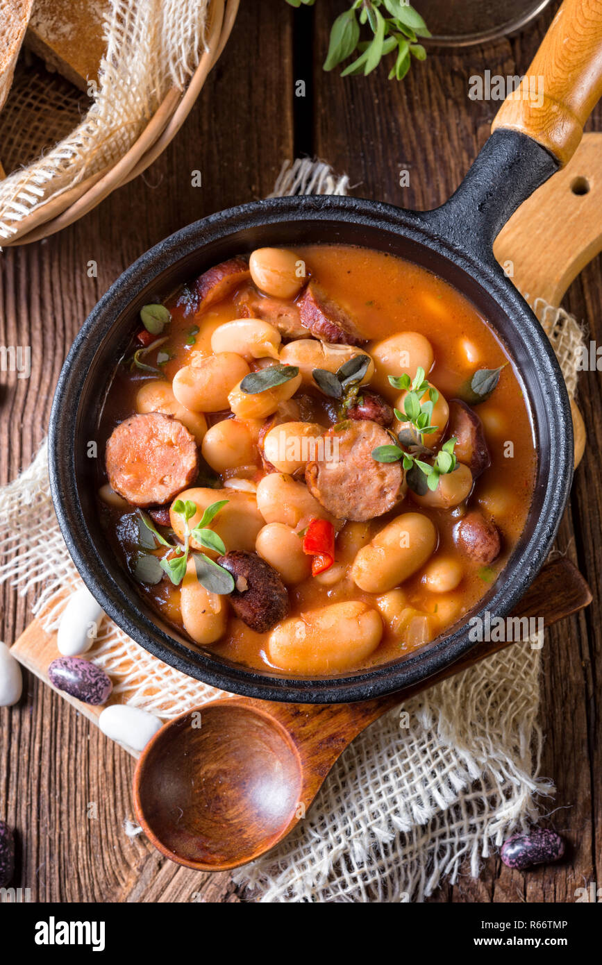 polish baked beans with sausage Stock Photo Alamy
