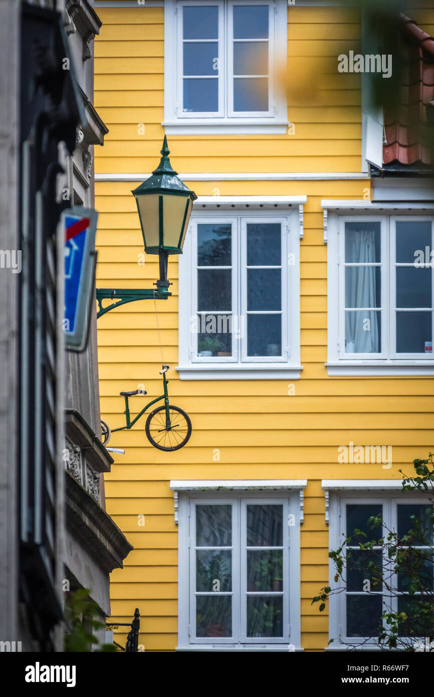 Windows of an old yellow house in Bergen Stock Photo