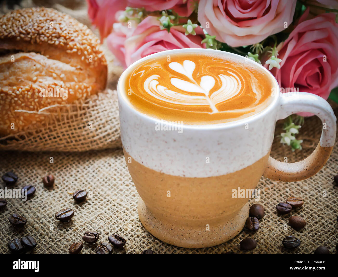 Decoration of cappucino coffee with bread and beans. Stock Photo