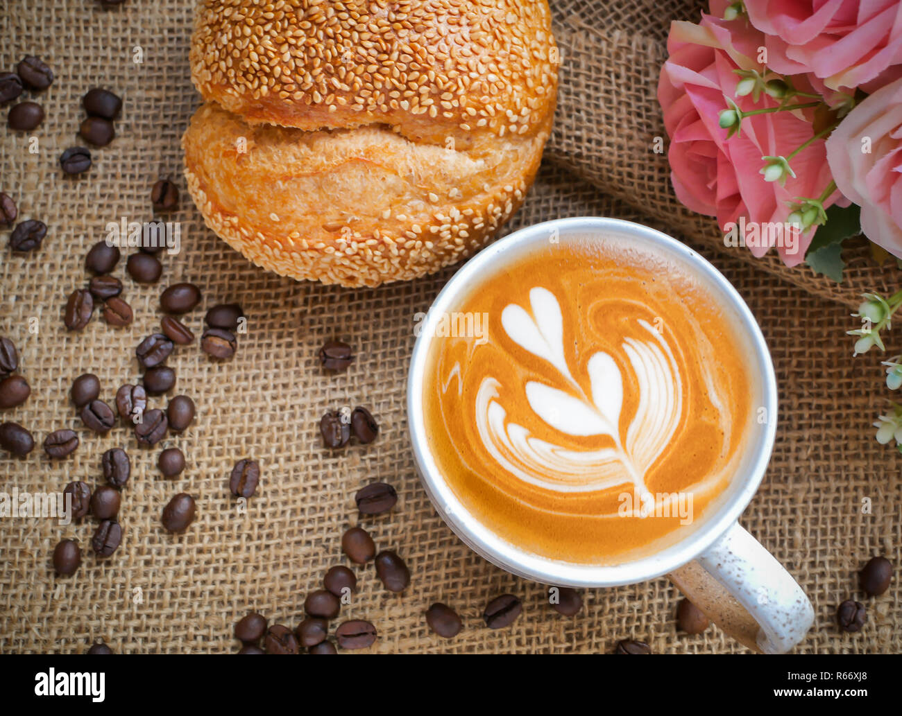 Decoration of cappucino coffee with bread and beans. Stock Photo
