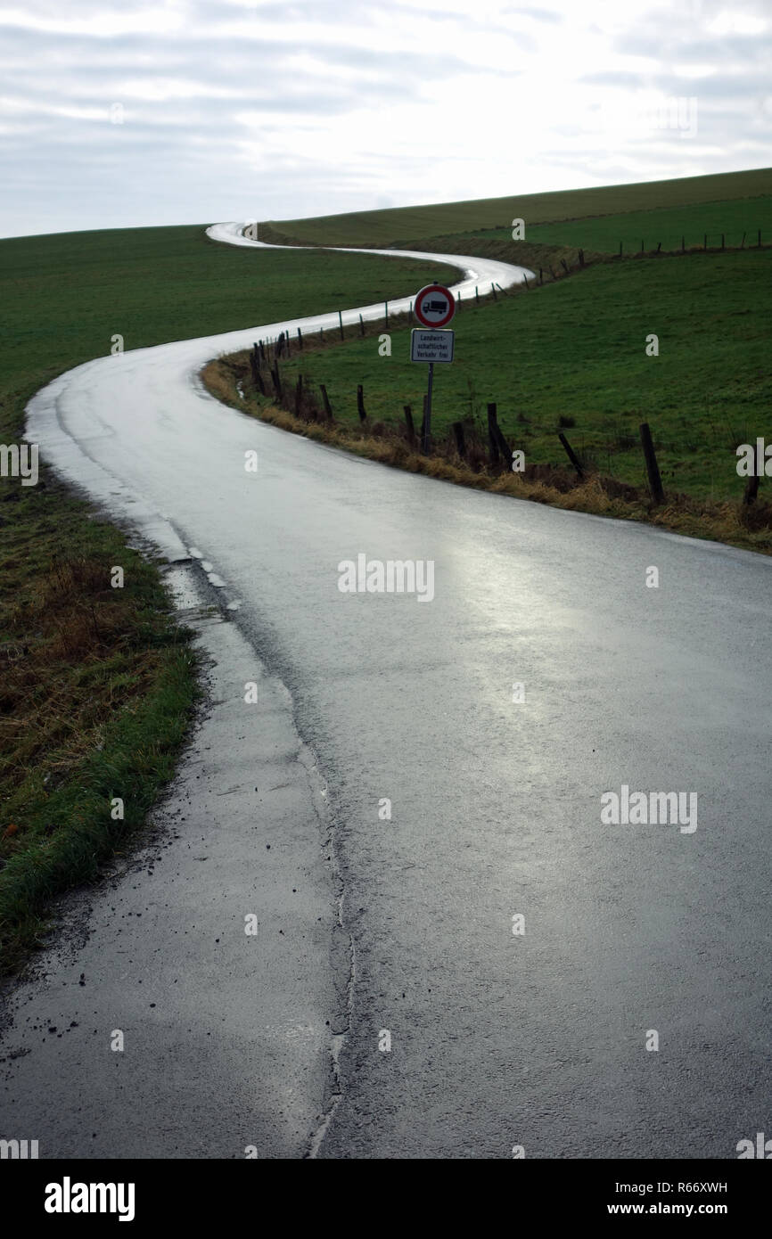 winding country road in the sauerland Stock Photo