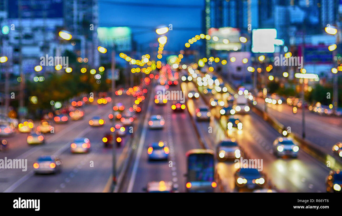 Evening traffic,Motion blur and bokeh effect viewed from the road bridge, Thailand. Stock Photo