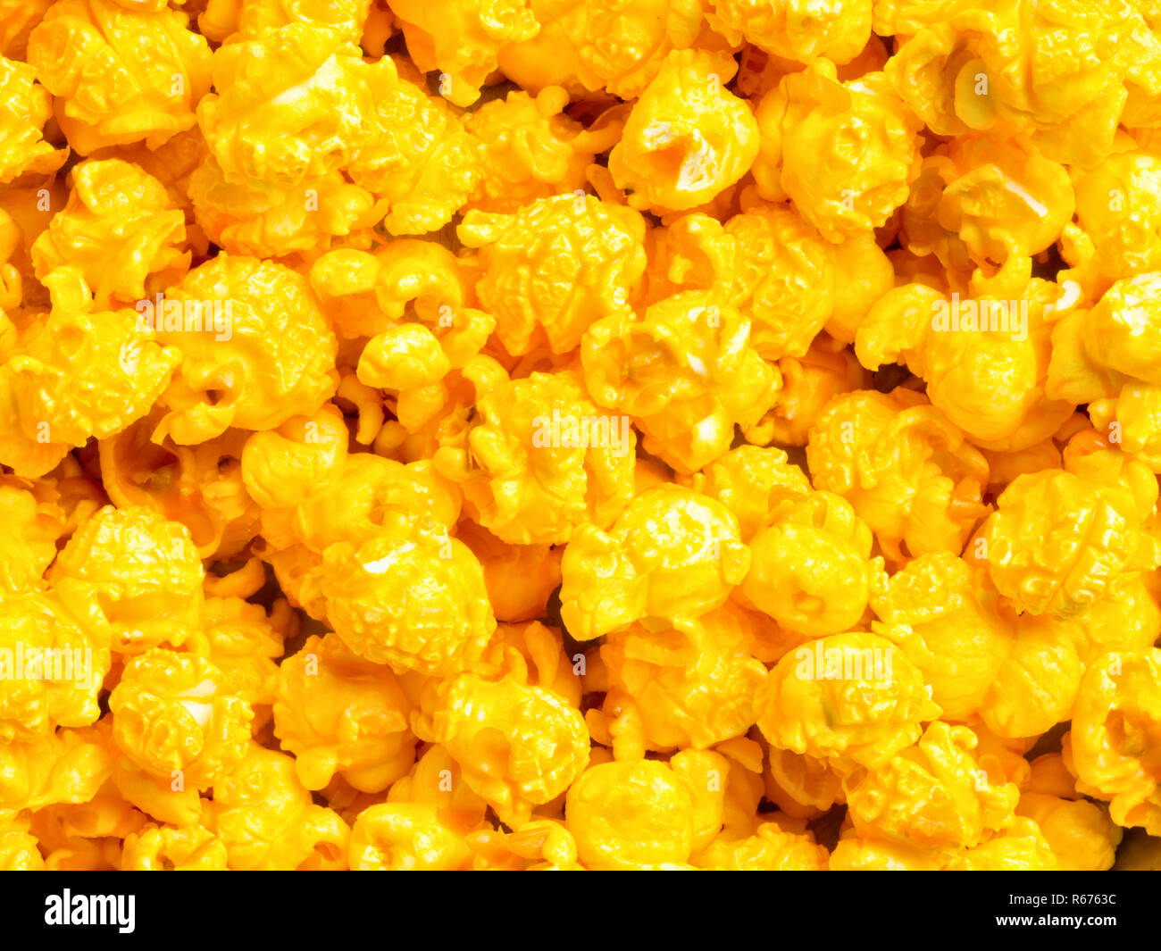 golden cheese popcorn food background Stock Photo