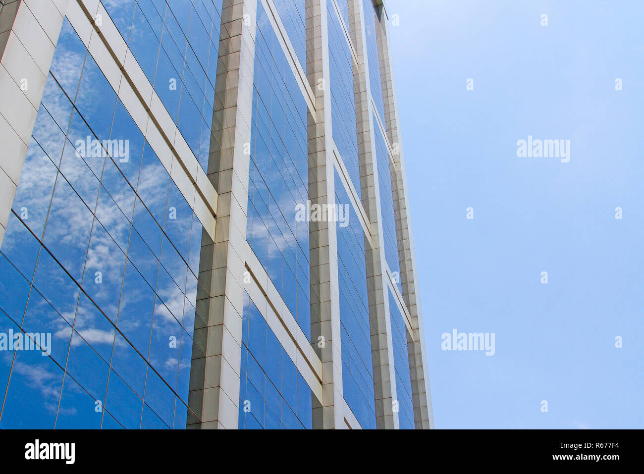 The building reflects with blue sky Stock Photo - Alamy
