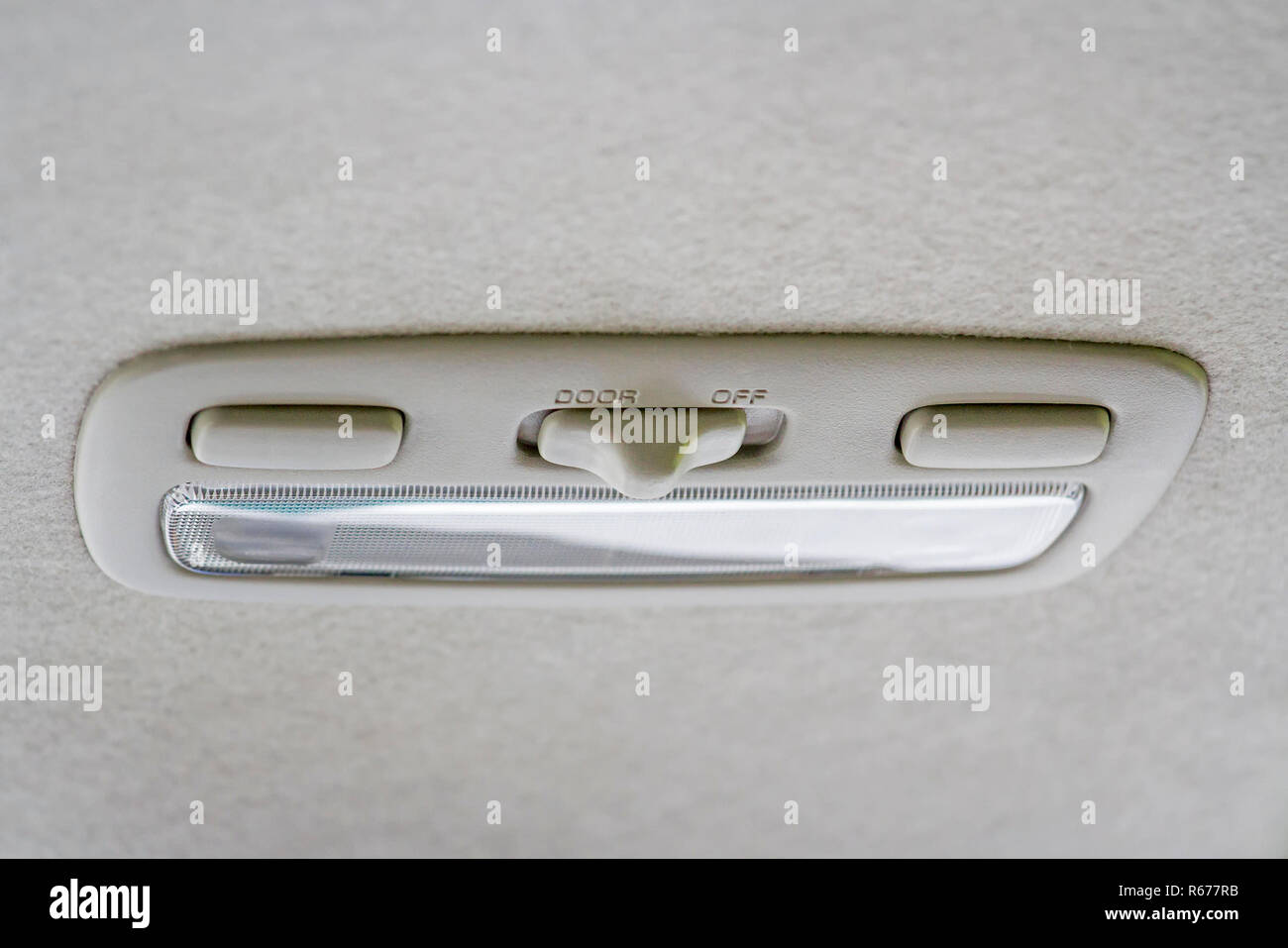 Switch lights in the cabin color cream. Stock Photo