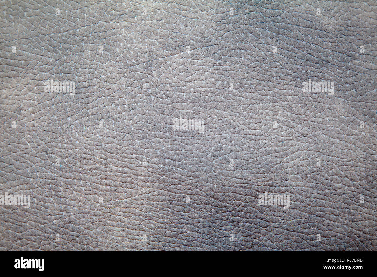 light brown leather upholstery for furniture as background indoor