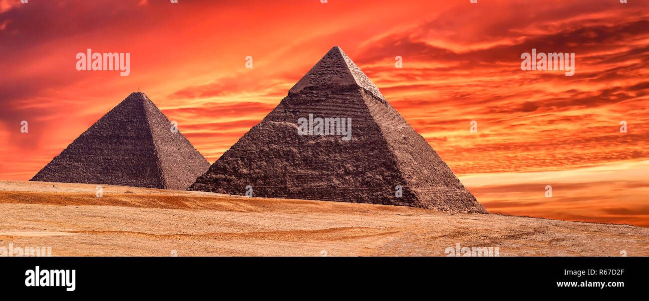 Panorama of the area with the great pyramids of Giza at amazing sunset ...