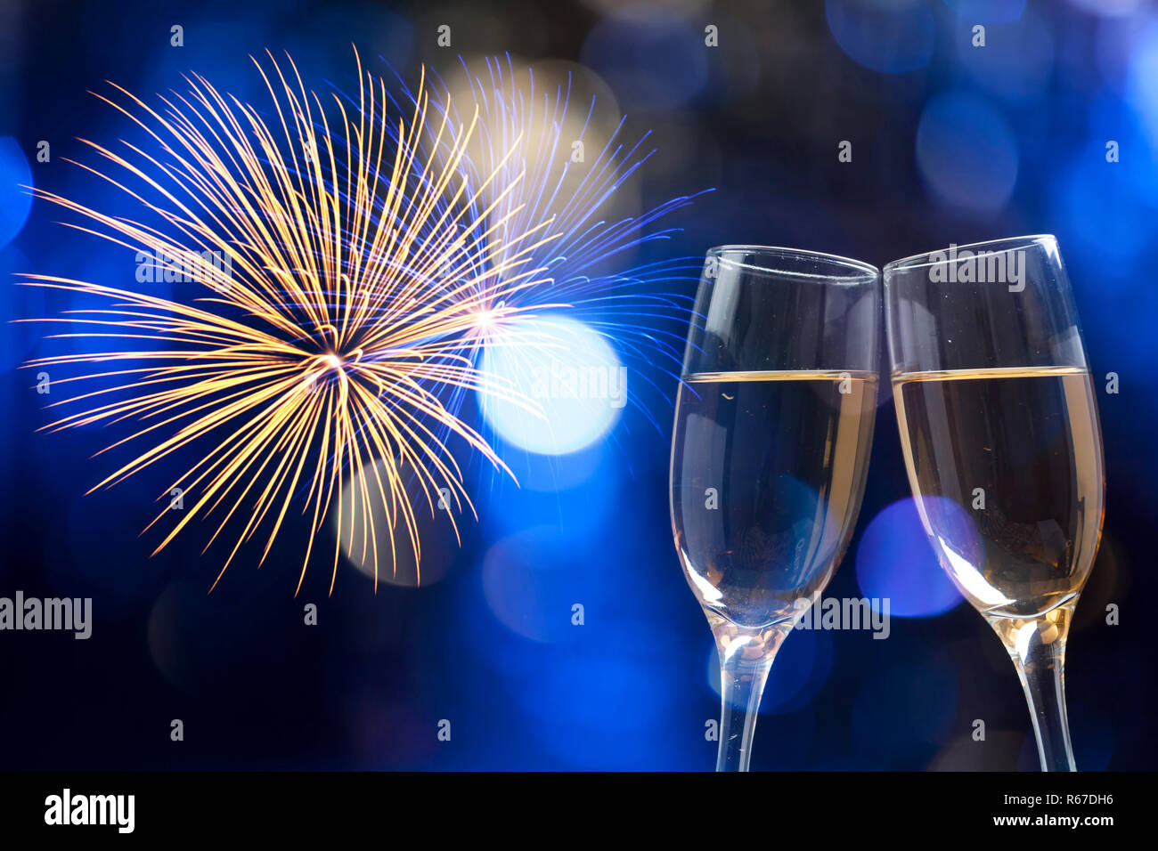 Champagne glasses on sparkling background Stock Photo Alamy