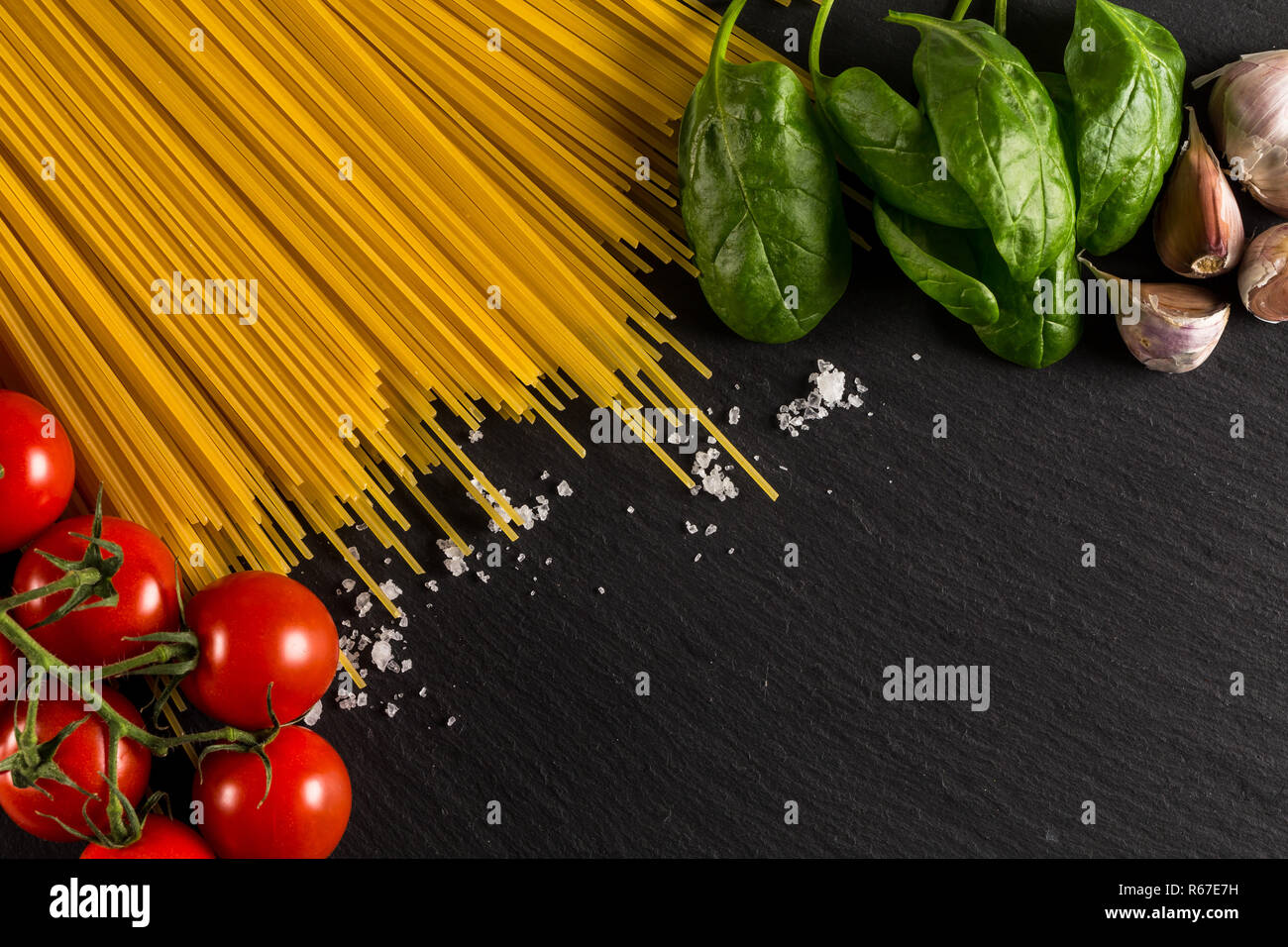 Culinary background for pasta, tomato, herbs and spices Stock Photo - Alamy