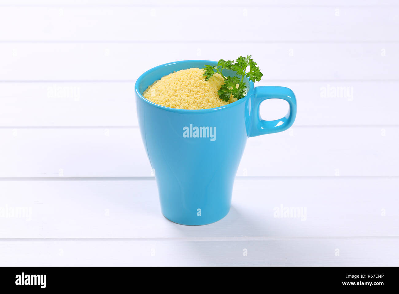 cup of raw couscous Stock Photo Alamy