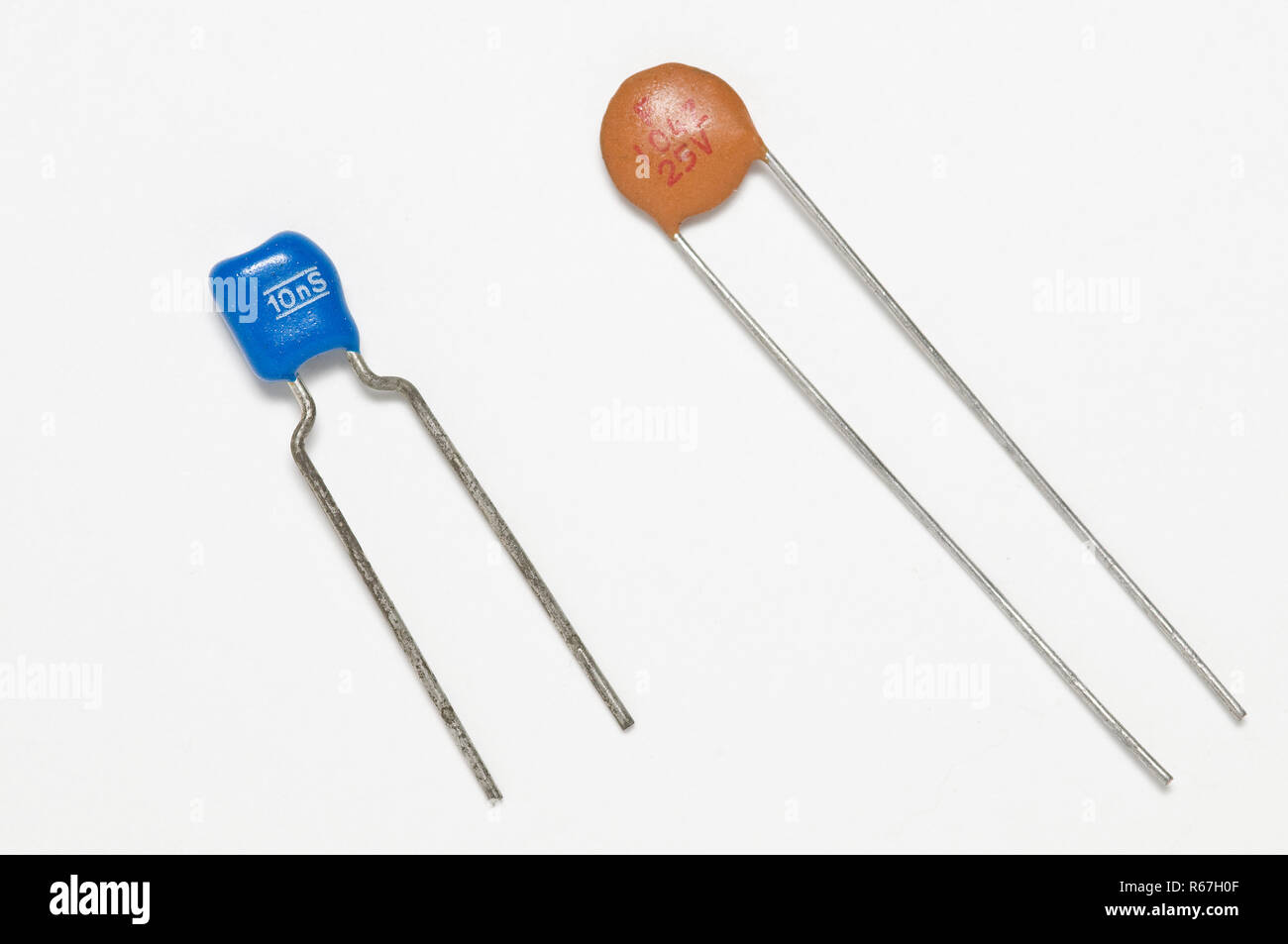 electronic capacitors on a white surface Stock Photo
