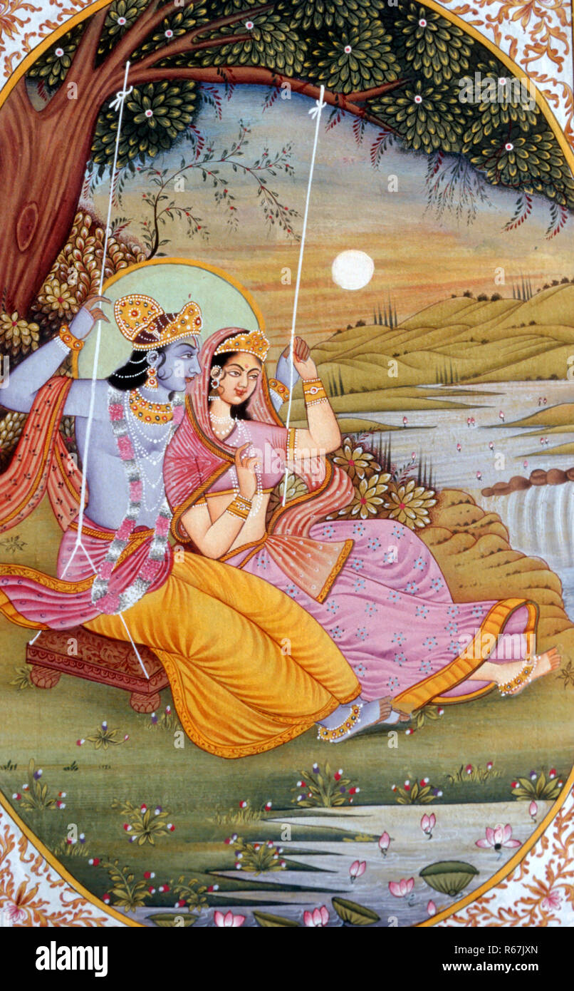 Radha Krishna on a swing in garden at sunset Miniature Painting, india Stock Photo