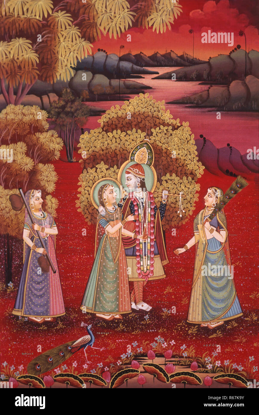 Radha Krishna in garden with peacock and maids with musical instruments, miniature painting on silk, India Stock Photo