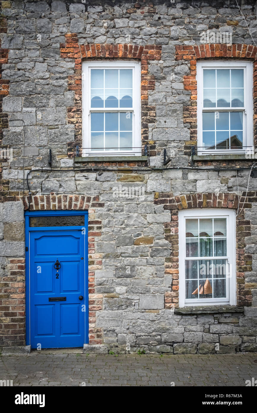 Blue doors and windows of an old home Stock Photo - Alamy