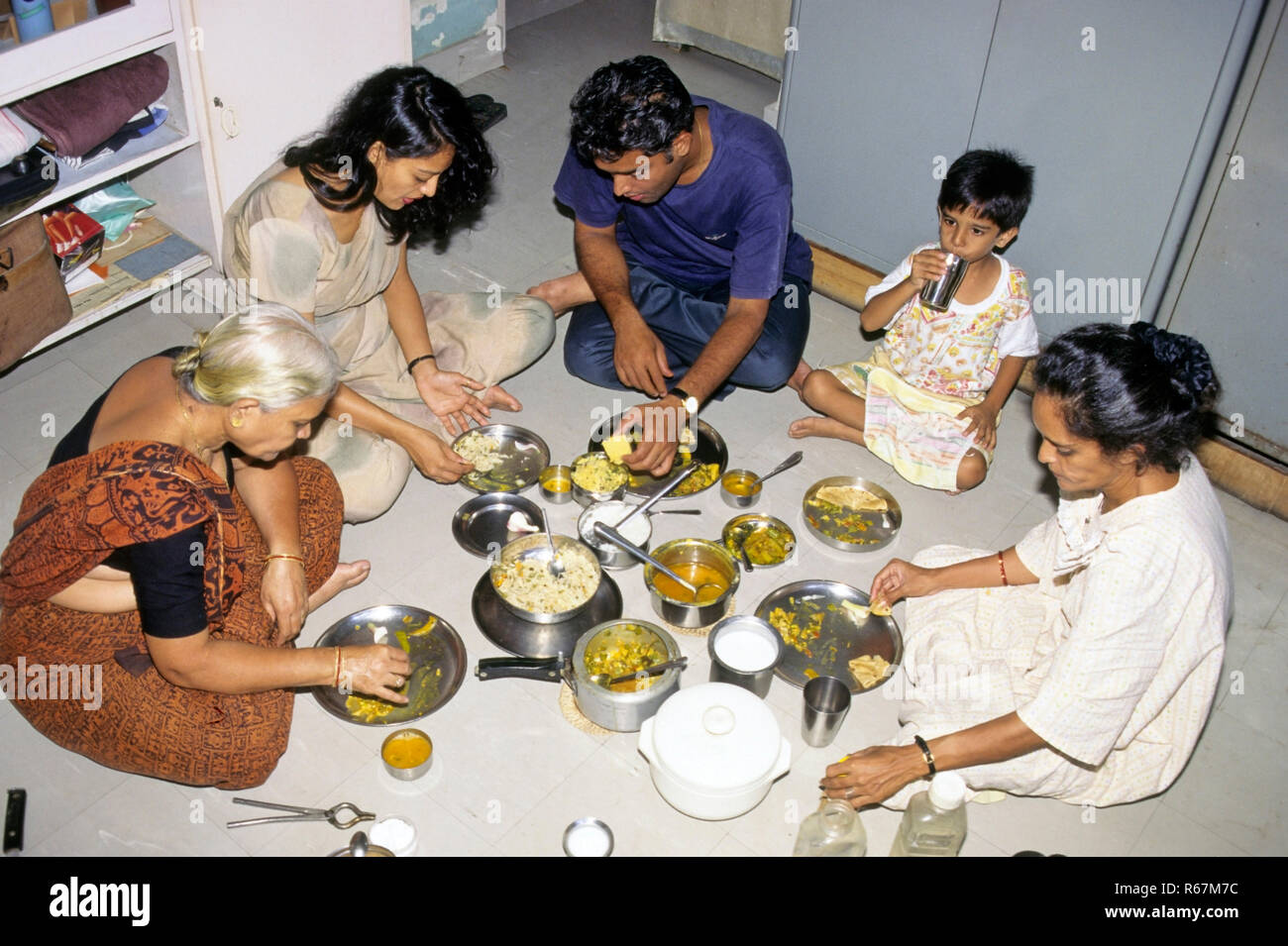 Indian Family Sitting Floor Eating High Resolution Stock ...