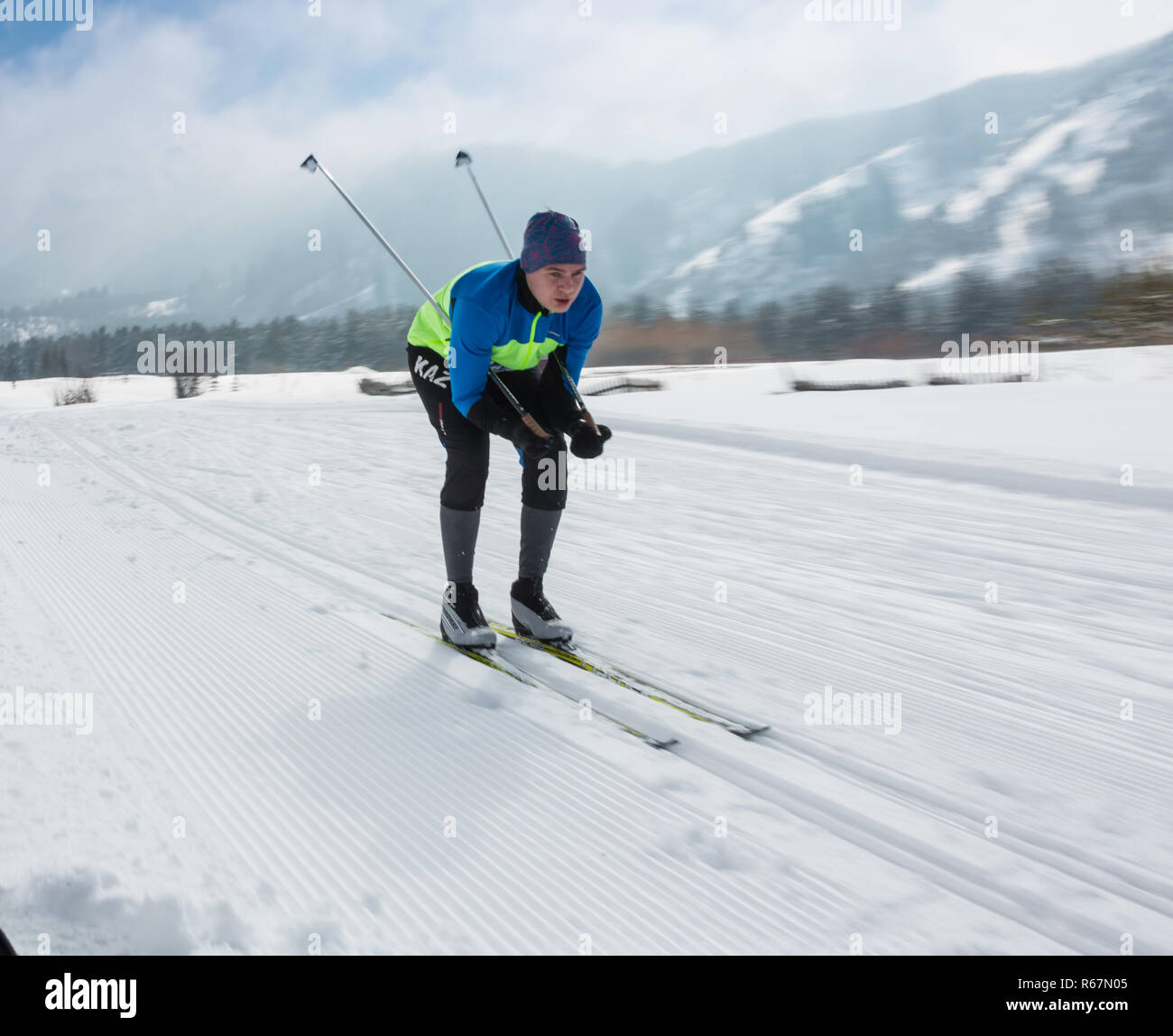 ALMATY, KAZAKHSTAN - FEBRUARY 18, 2017: amateur competitions in the discipline of cross-country skiing, under the name of ARBA Ski Fest. A man cross-c Stock Photo