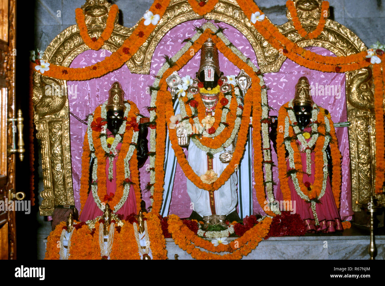 idol of god balaji with his wives, india Stock Photo - Alamy