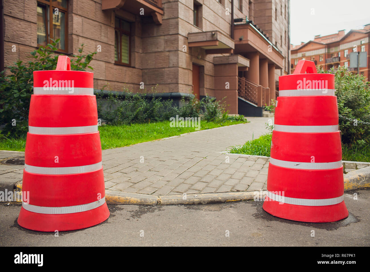 road red plastic block safety fencing repair work on carriageway