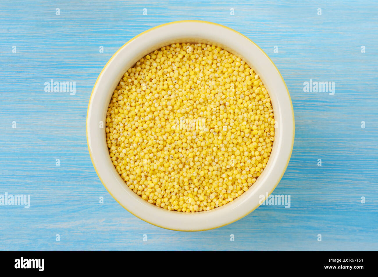 Millet .Grain with  mildly sweet flavor.It  is tasty, soothing, non-acid forming, and contains a myriad of beneficial nutrients. Stock Photo