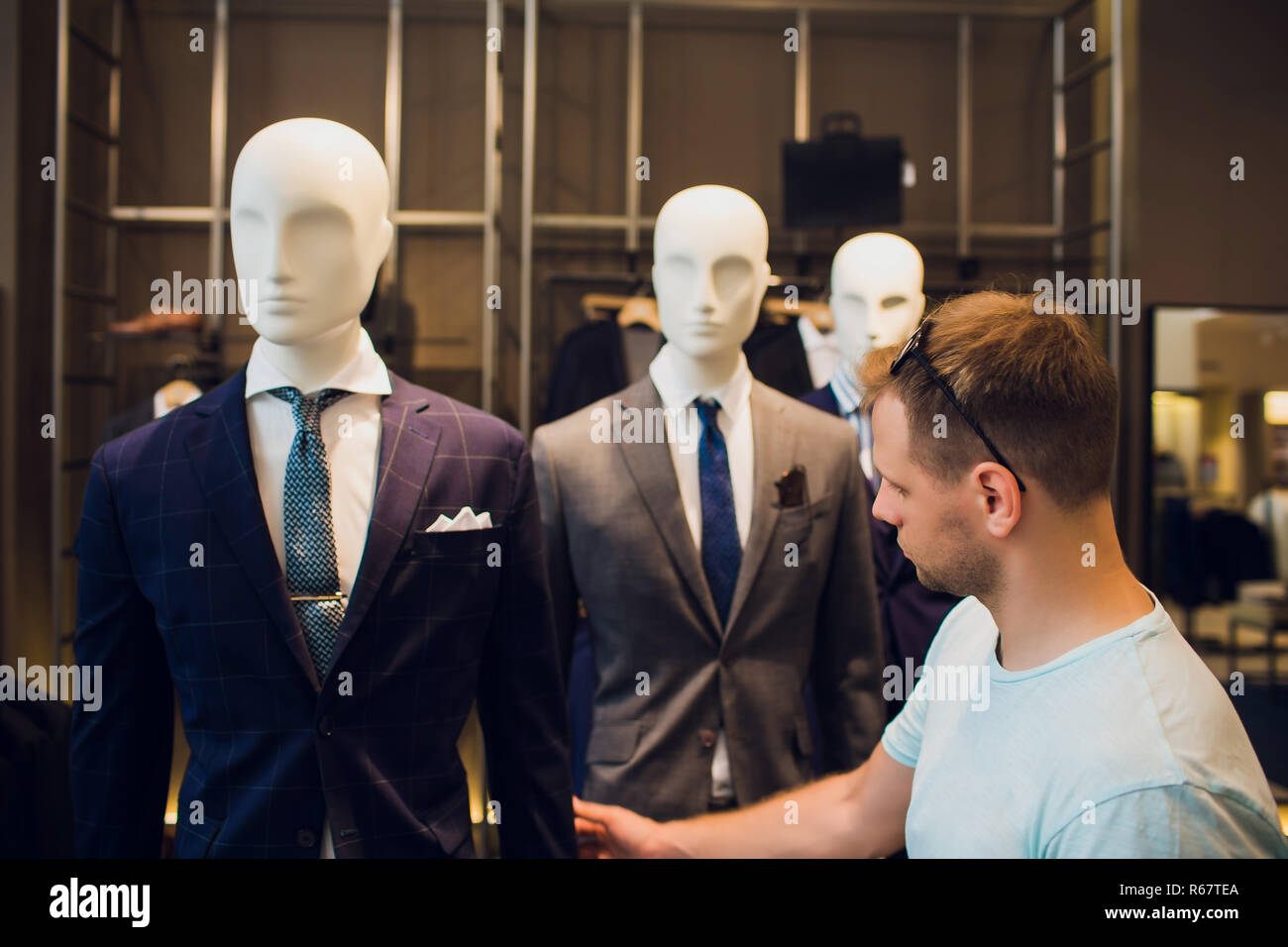 Two male mannequins dressed in suit. No brand names or copyright objects. Stock Photo