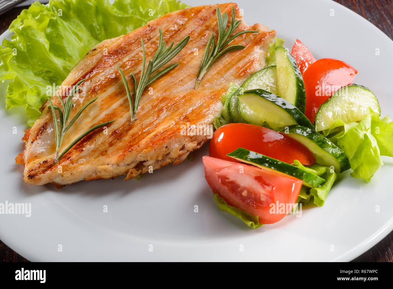 Delicious grilled chicken fillet Stock Photo - Alamy