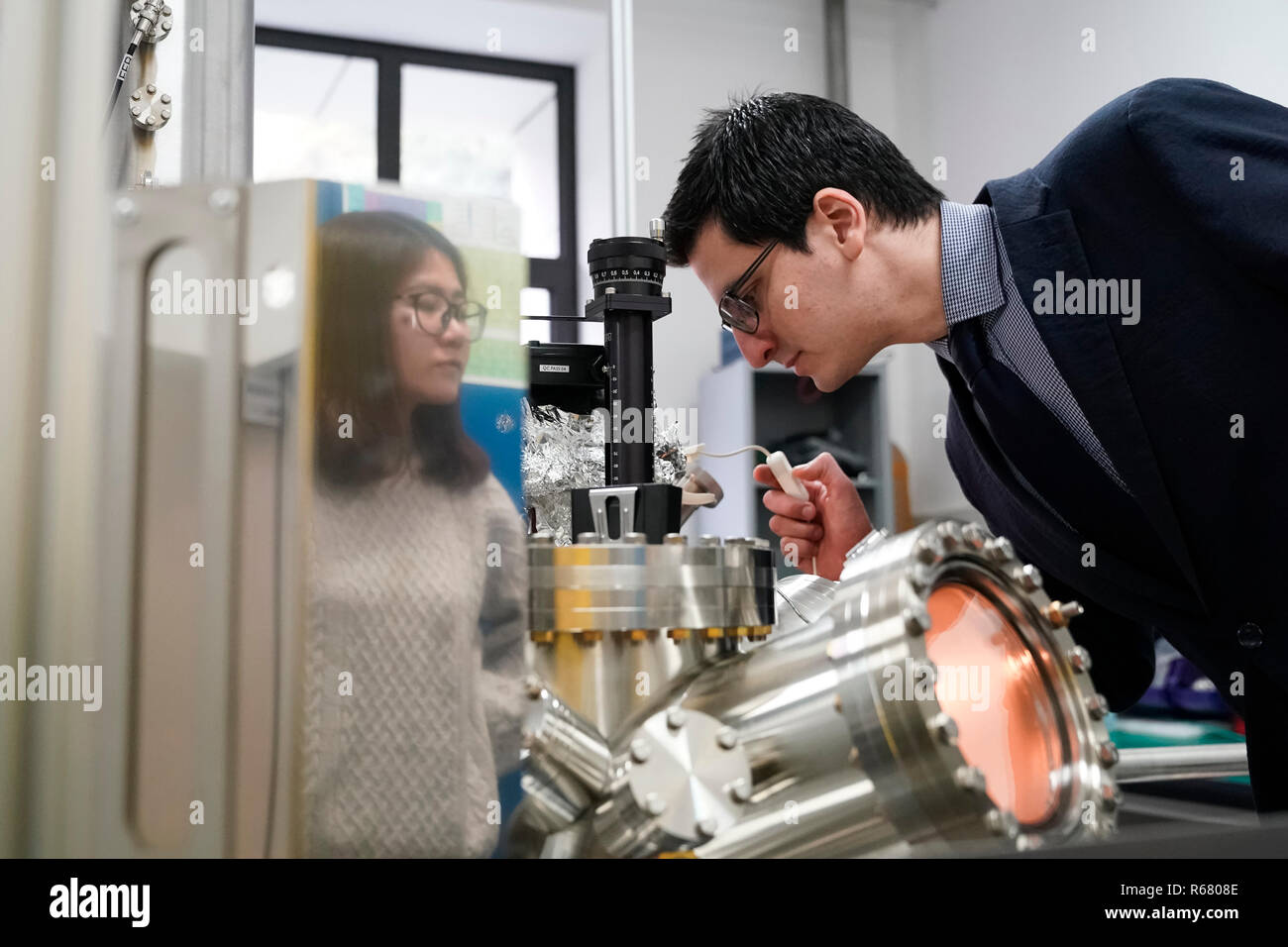 (181204) -- BEIJING, Dec. 4, 2018 (Xinhua) -- Carlos-Andres Palma works in a lab in Beijing, capital of China, Nov. 29, 2018. Carlos-Andres Palma, born in 1982, came from Germany to China in 2017 to work as a professor of physics of molecular architecture and interfaces at the Institute of Physics of the Chinese Academy of Sciences. The reason that he came to China was because the opening China can offer opportunities to young scientists like him to follow up and study the world's latest academic achievements and expand research fields, Carlos-Andres Palma said. 'In China, to young scien Stock Photo